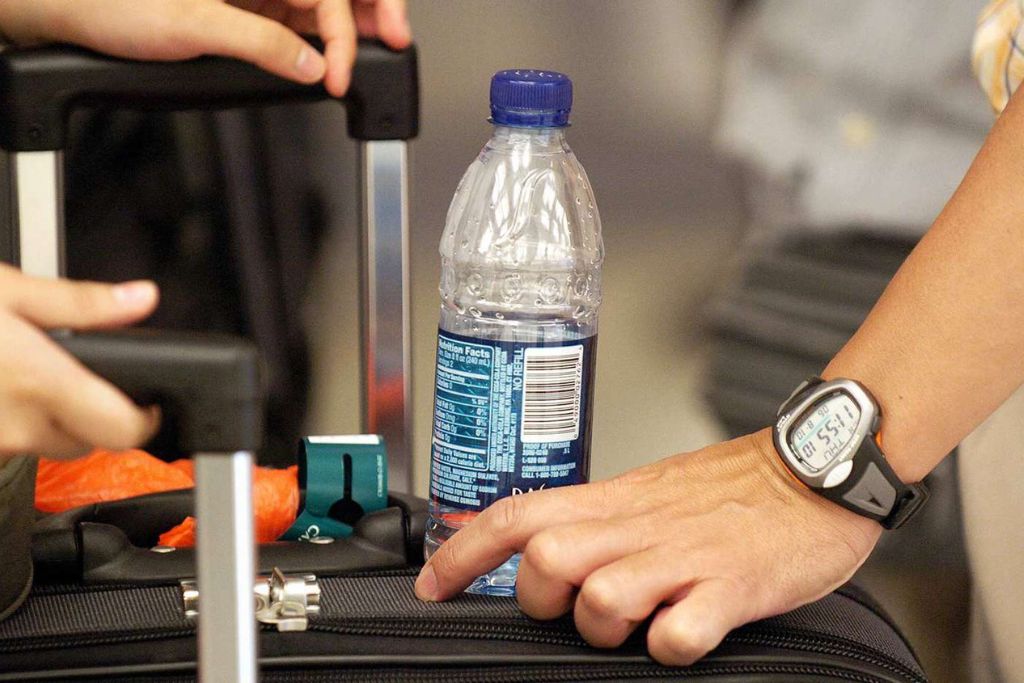 plastic water bottle to use on a plane